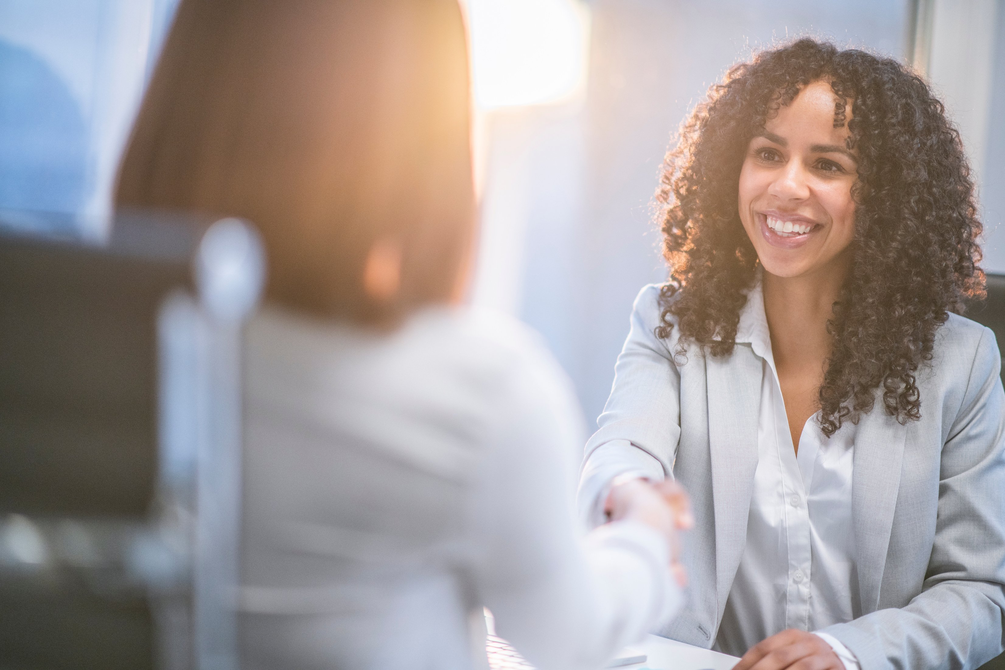 Smiling at a client